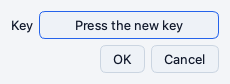 The dialog that reads Press the new key with OK and Cancel